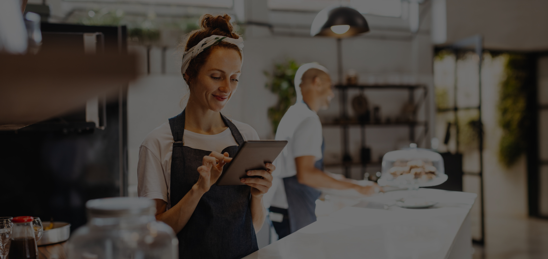 restaurant owner on tablet